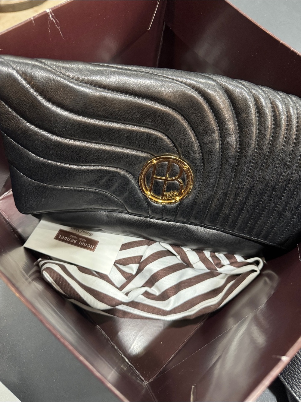 Black Quilted Leather Foldover Clutch with Gold Logo - Picture 2 of 3